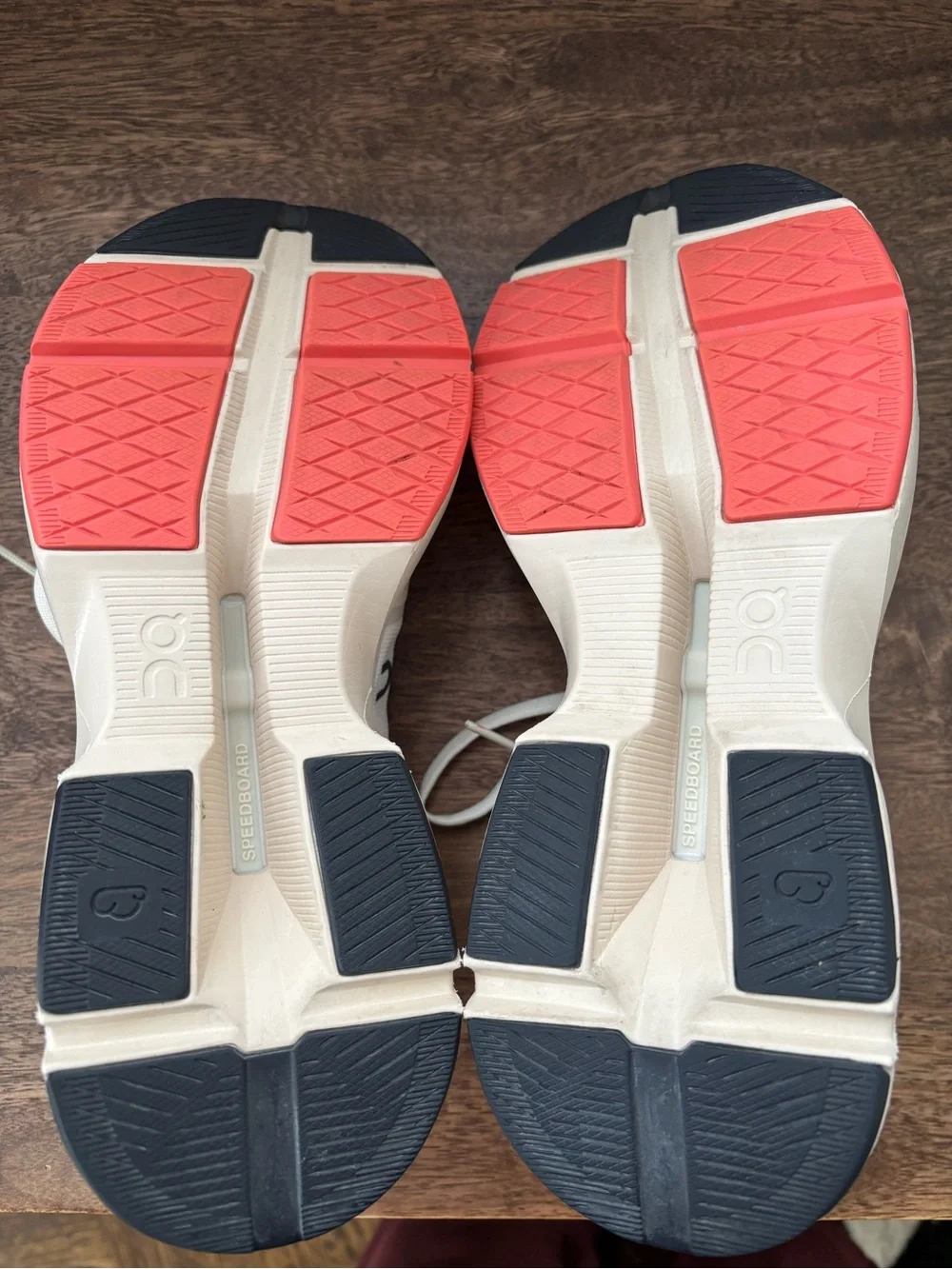 On Women's Cloudpulse Sneakers in Cream with Coral Lining